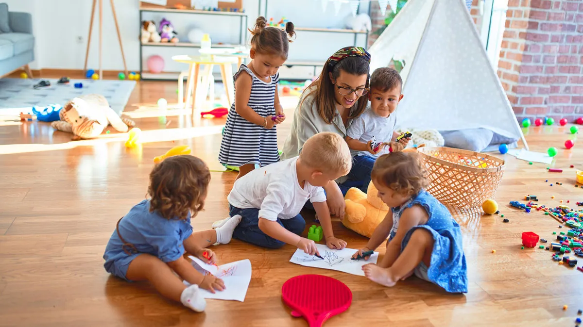 a group of children sitting on the floor