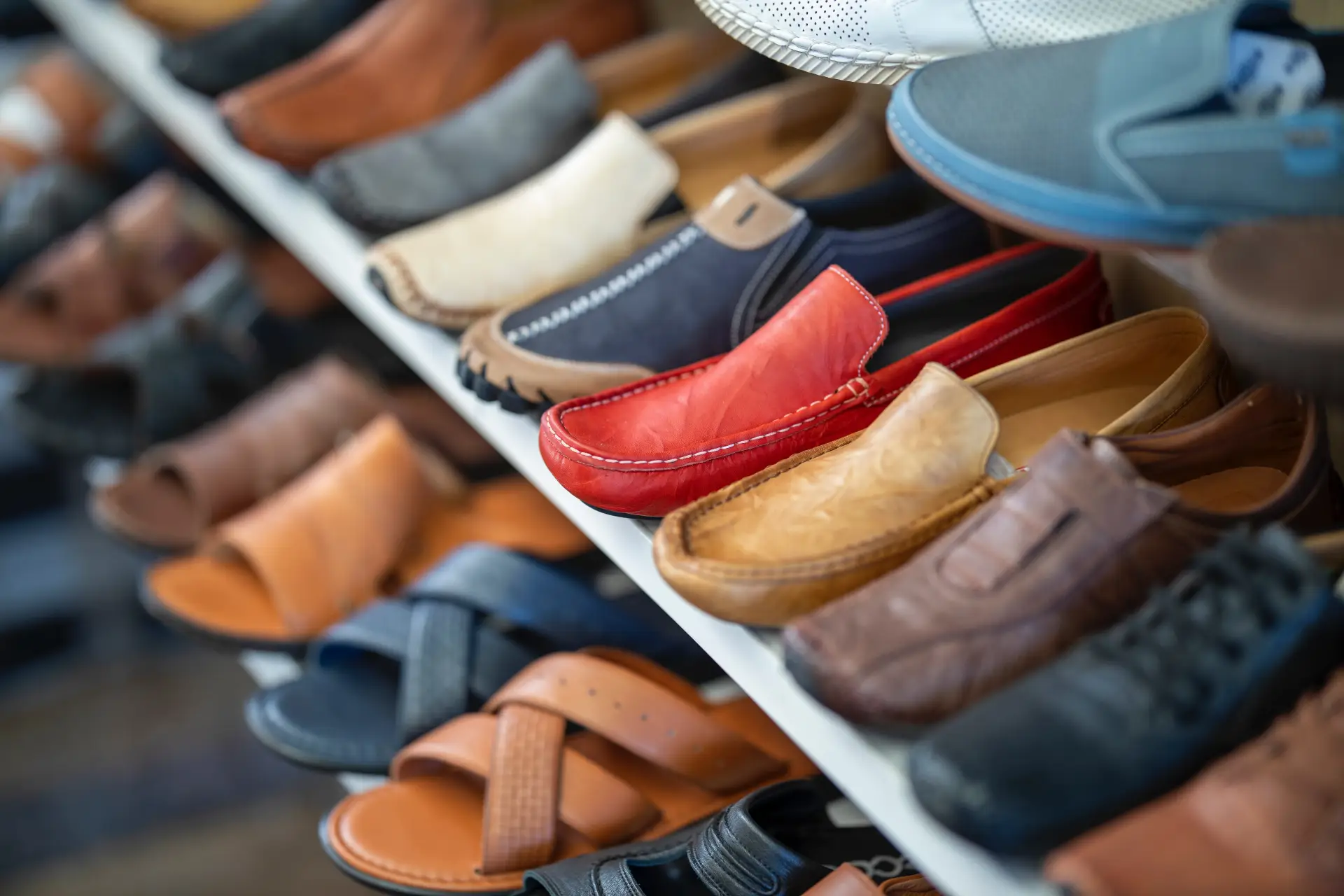 a shelf with shoes on it