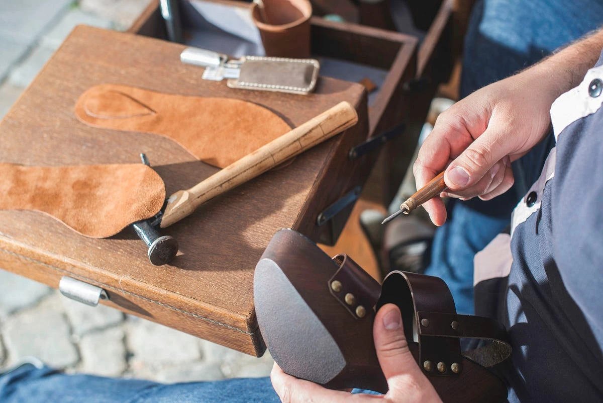 a person working on a shoe