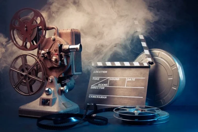 a movie projector and clapper board