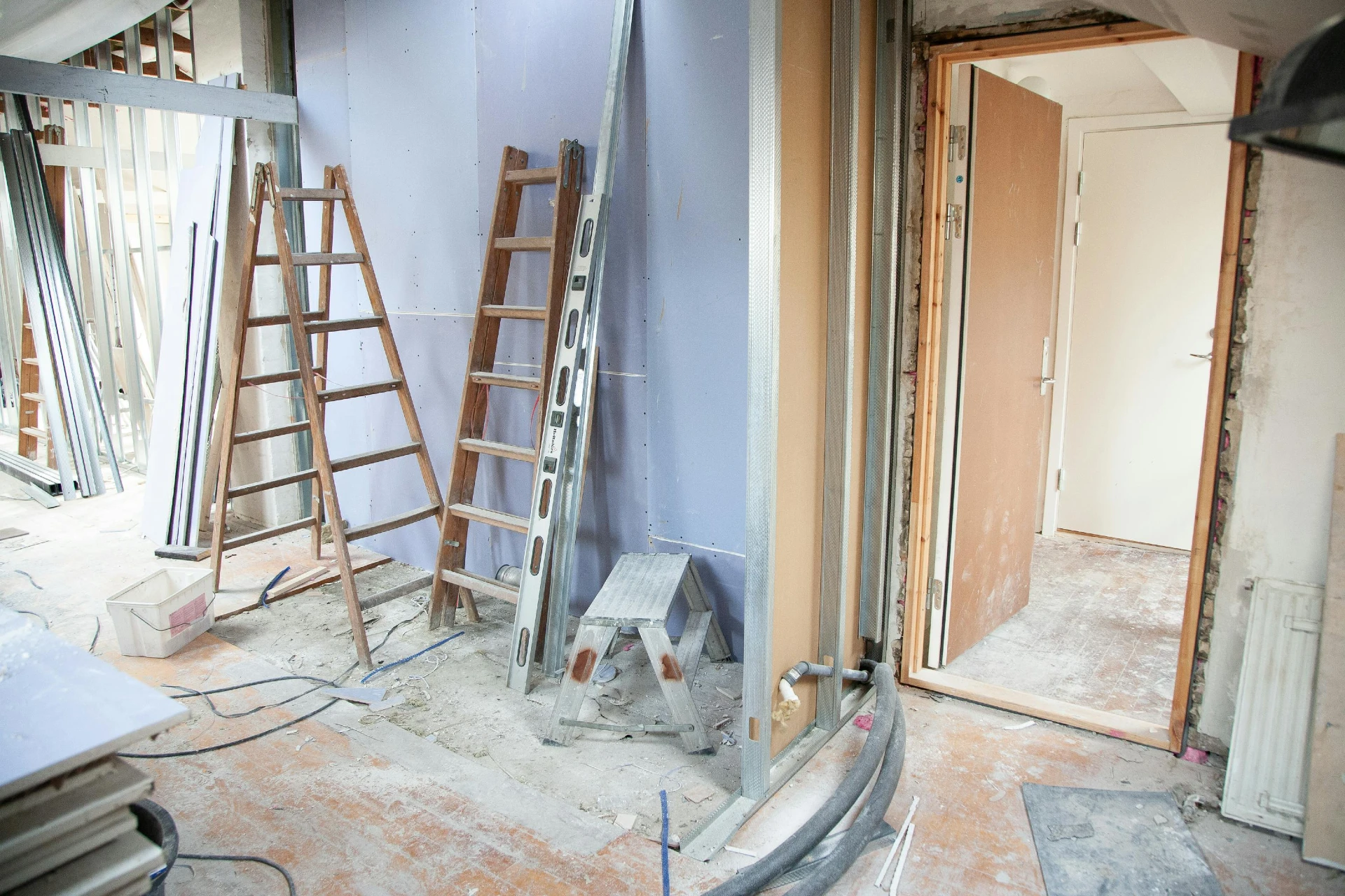 ladders and ladders in a room under construction